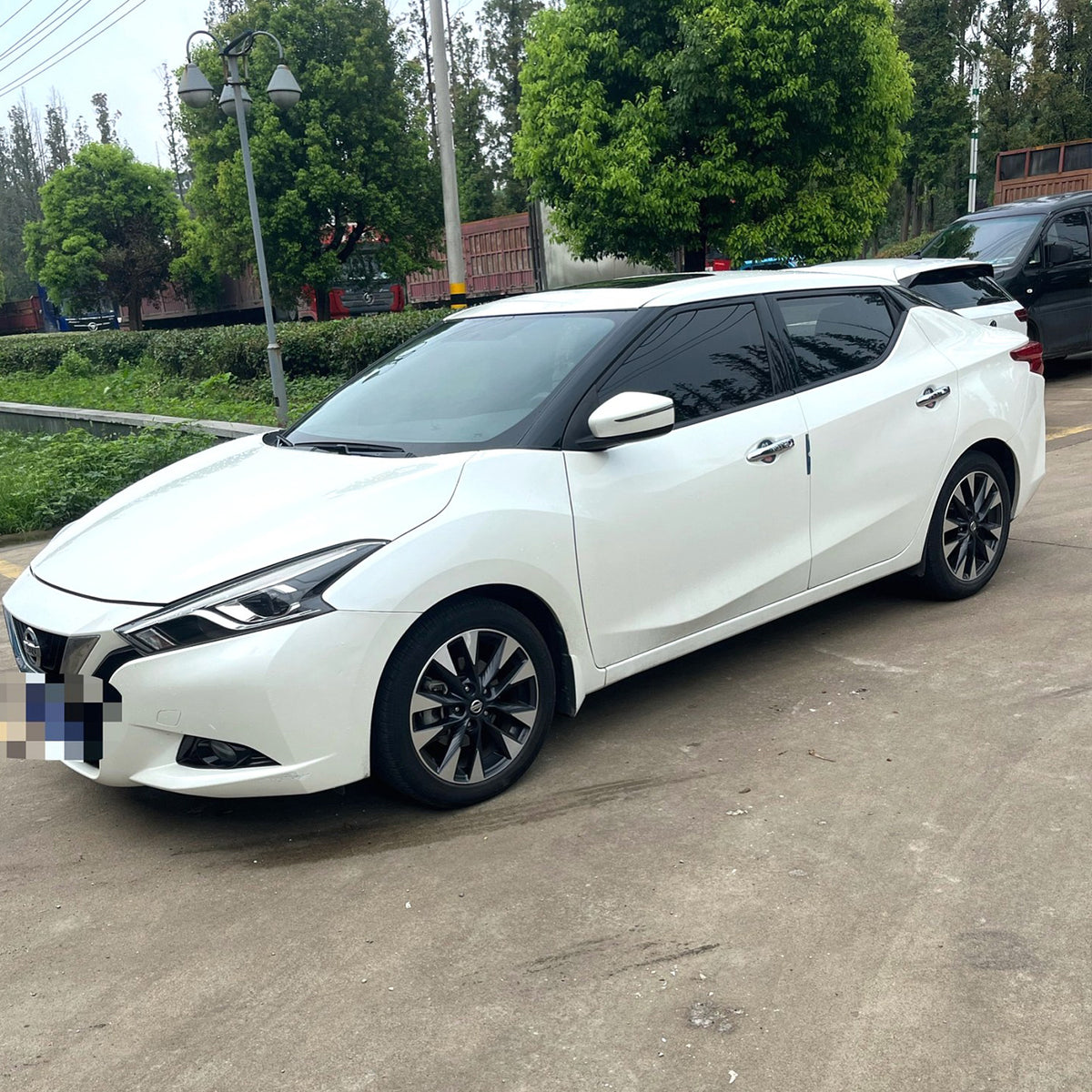 Nissan Lannia 2016 белый 1.6L 